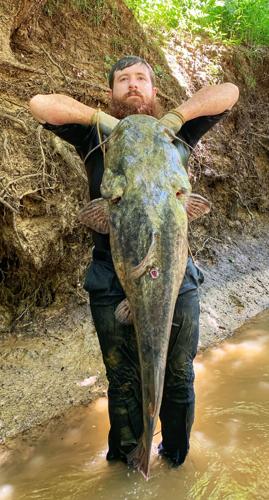 When 'noodling' Tony Gibson gets a bite, he really gets a bite