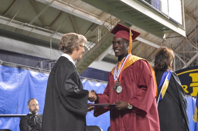 'Congraduations' About 500 students graduate from Science Hill High School during Saturday