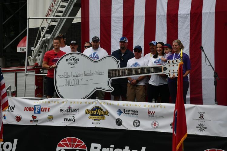 Hard Rock guitar-shaped giant check presented