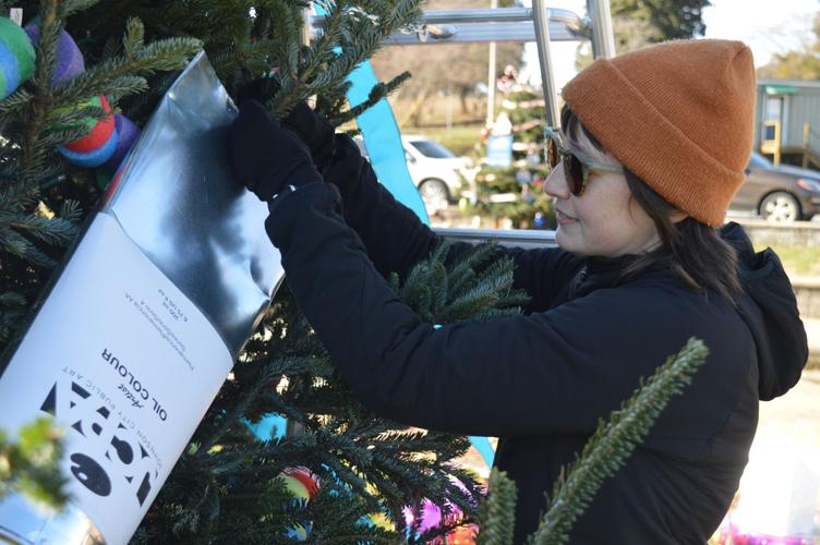 PHOTOS Groups decorate 150 Christmas trees in Founders, King Commons
