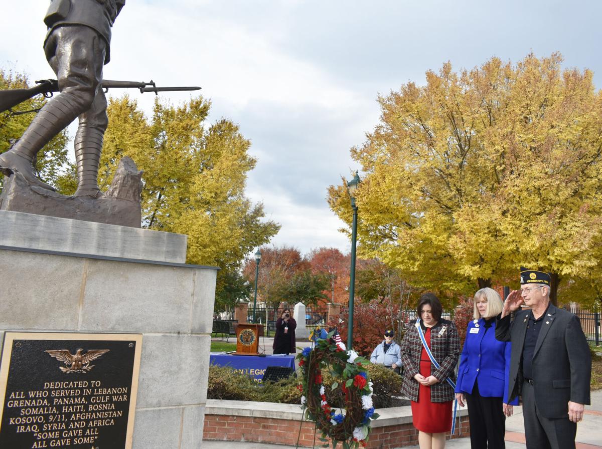 Placing a wreath at the Doughboy