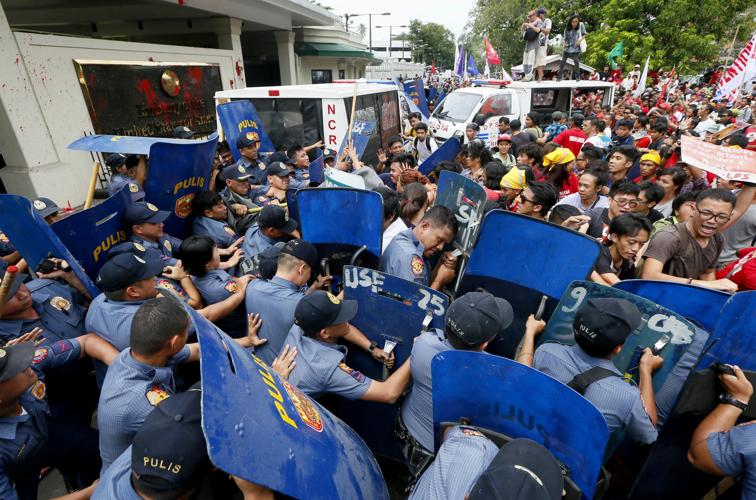 Philippine police van rams protesters in front of US Embassy