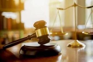 Woman arrested in child battery case