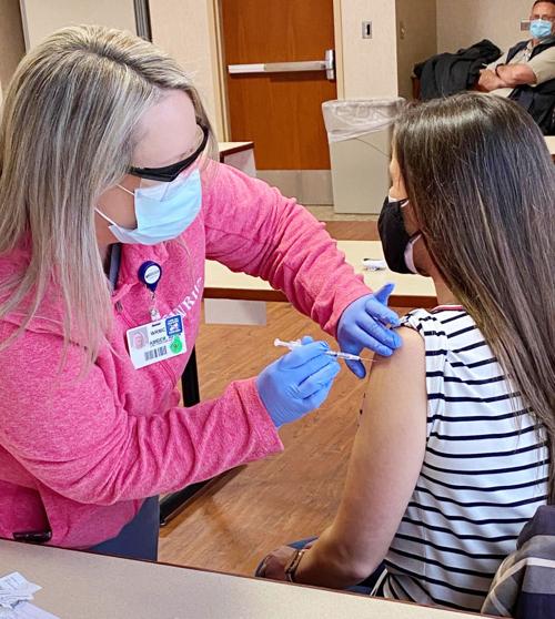 VACCINATING FRONT LINE WORKERS