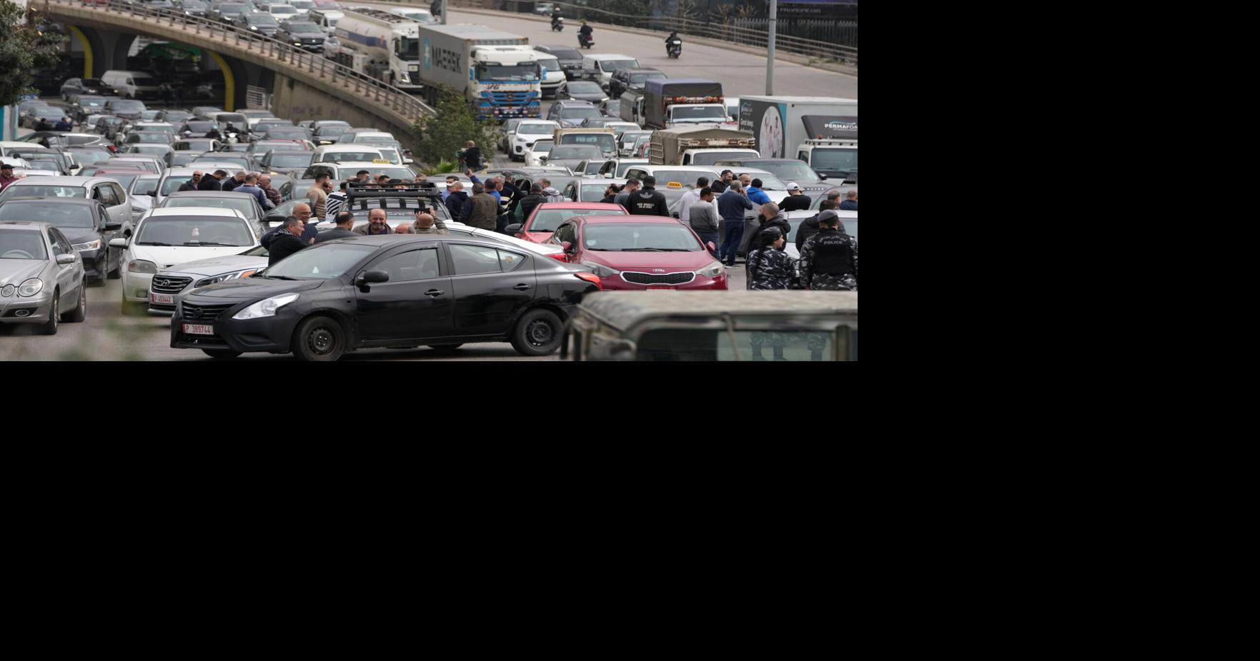 Protesters block Beirut roads after Cabinet approves new taxes that raise fuel prices