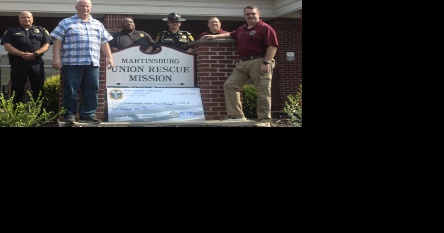 Police lodge's $5,000 gift helps fund meals, shelter at rescue mission