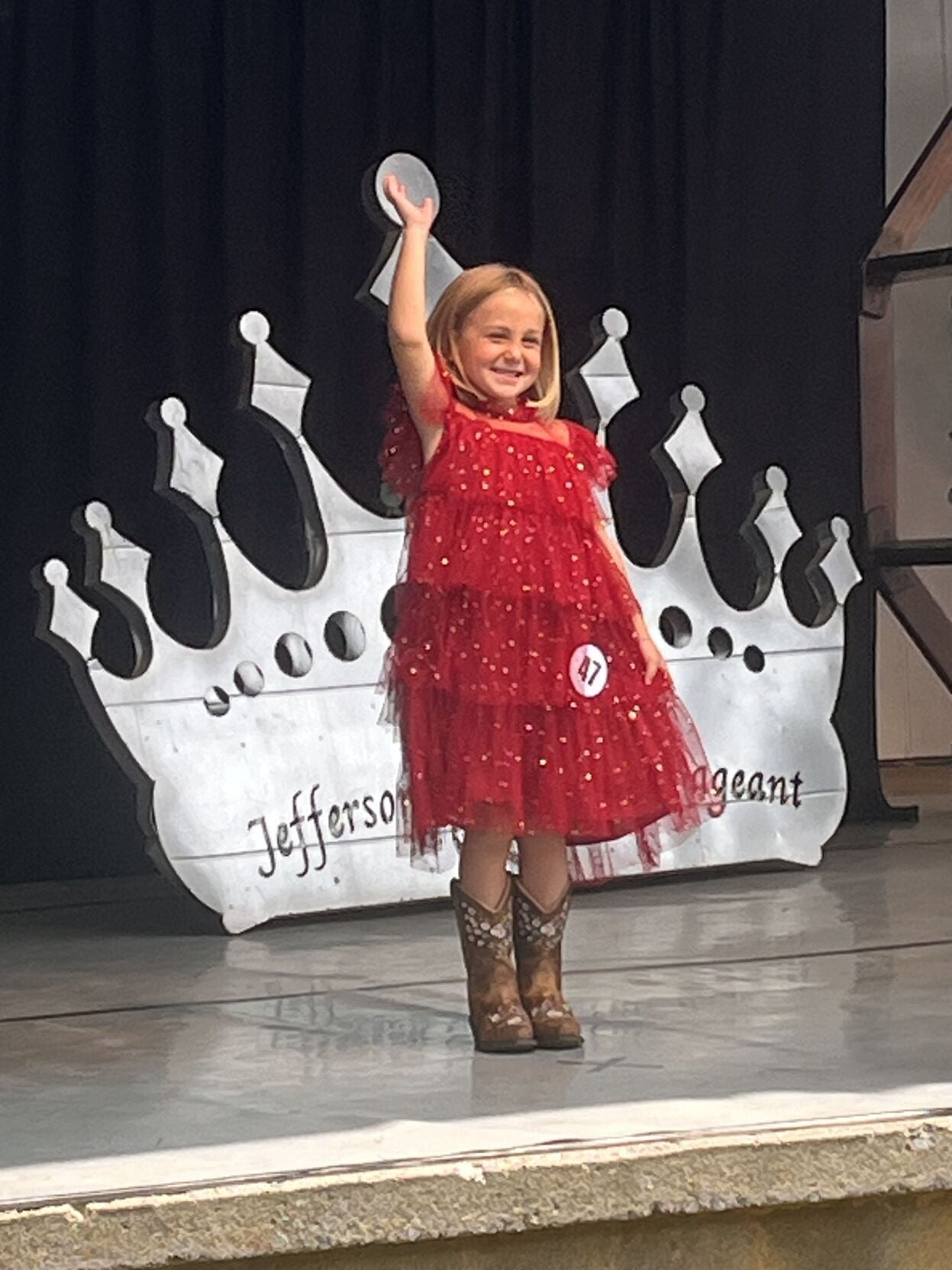 Jefferson Fair Little Miss winners Makenna Morris and Raylynn Smith posing on stage