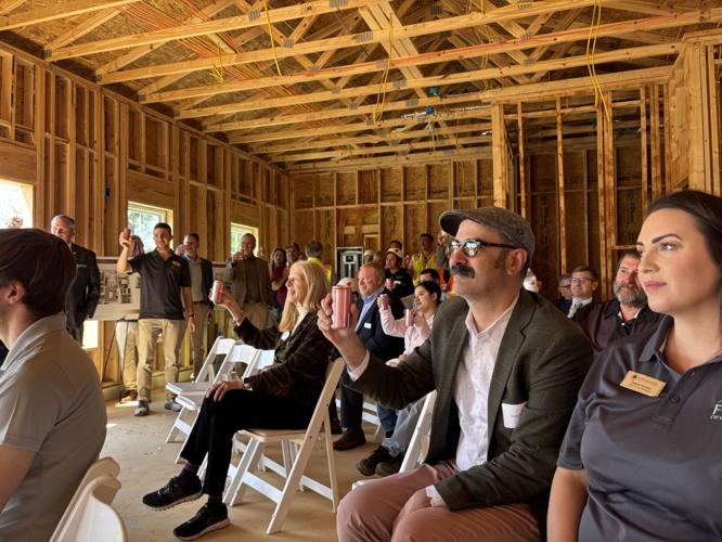 Delmar Orchard Apartments celebrates with a beam signing ceremony ...