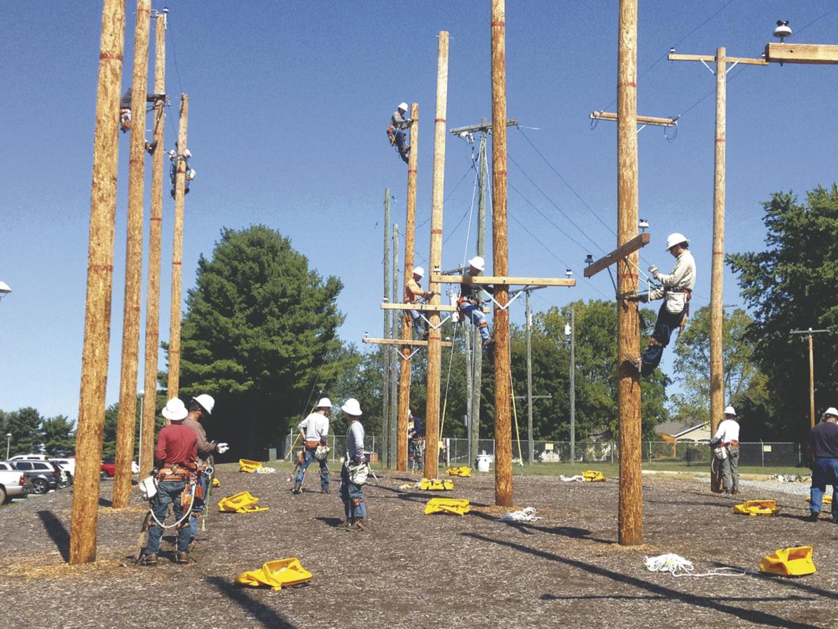 New Heights: Electric workers train for climbing poles, Local News
