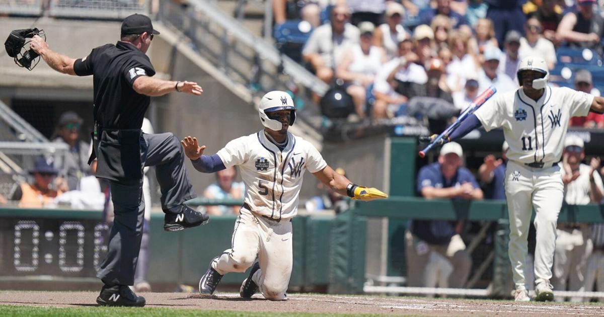 Mountaineers score late to down Troy in College World Series opener