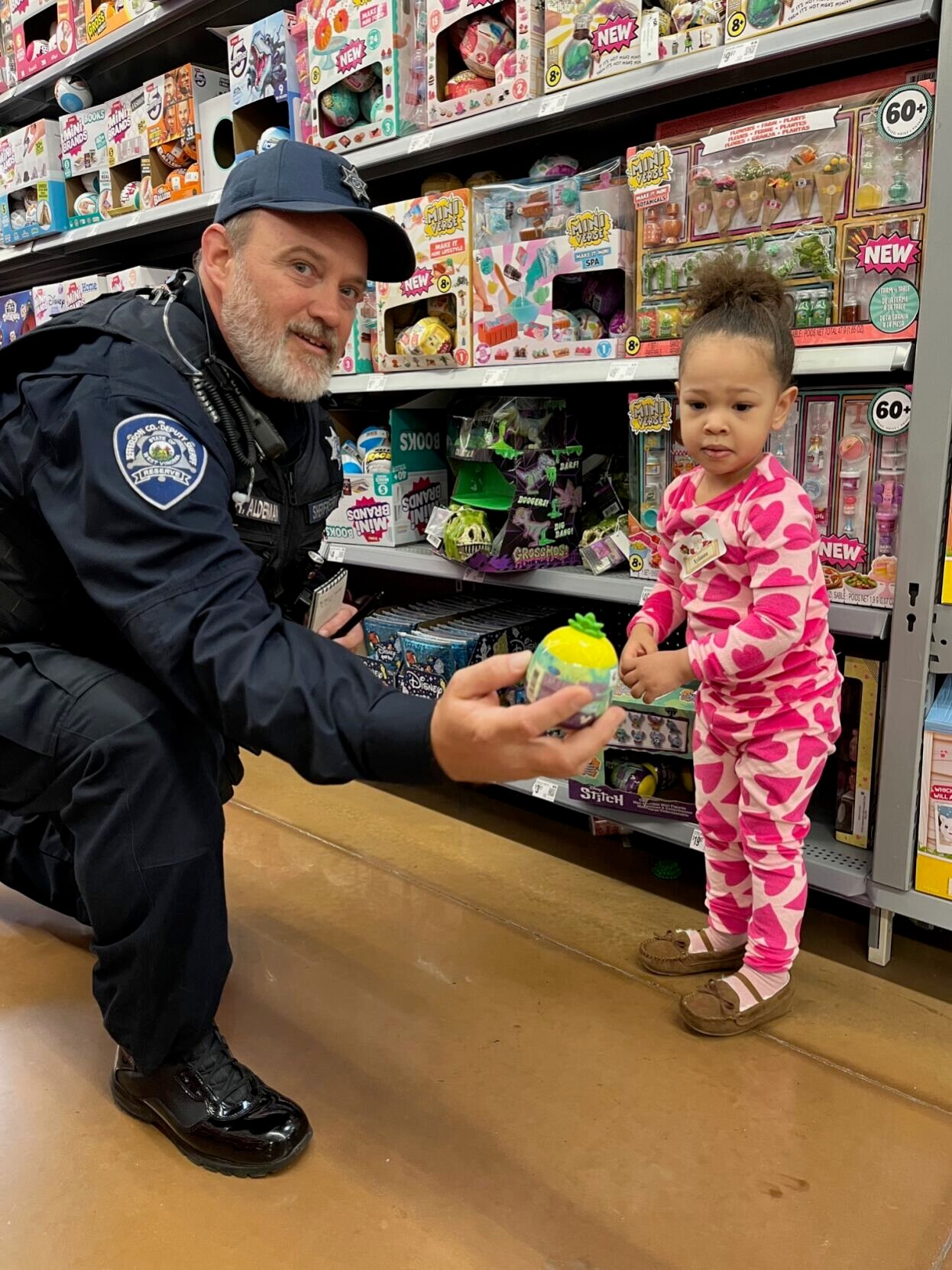 Community Comes Together for Christmas Shopping with Law Enforcement: 'Santa with a Badge' Event Brings Joy to Children