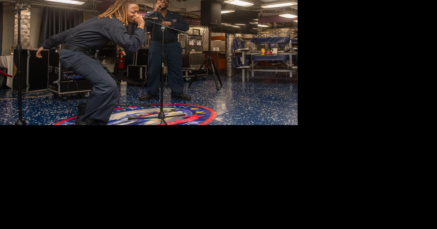 Ranson native sings during an open-mic night aboard USS Ronald Reagan ...