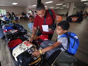 Porsche Jones' BOND Love Day event equips 955 students for the school year