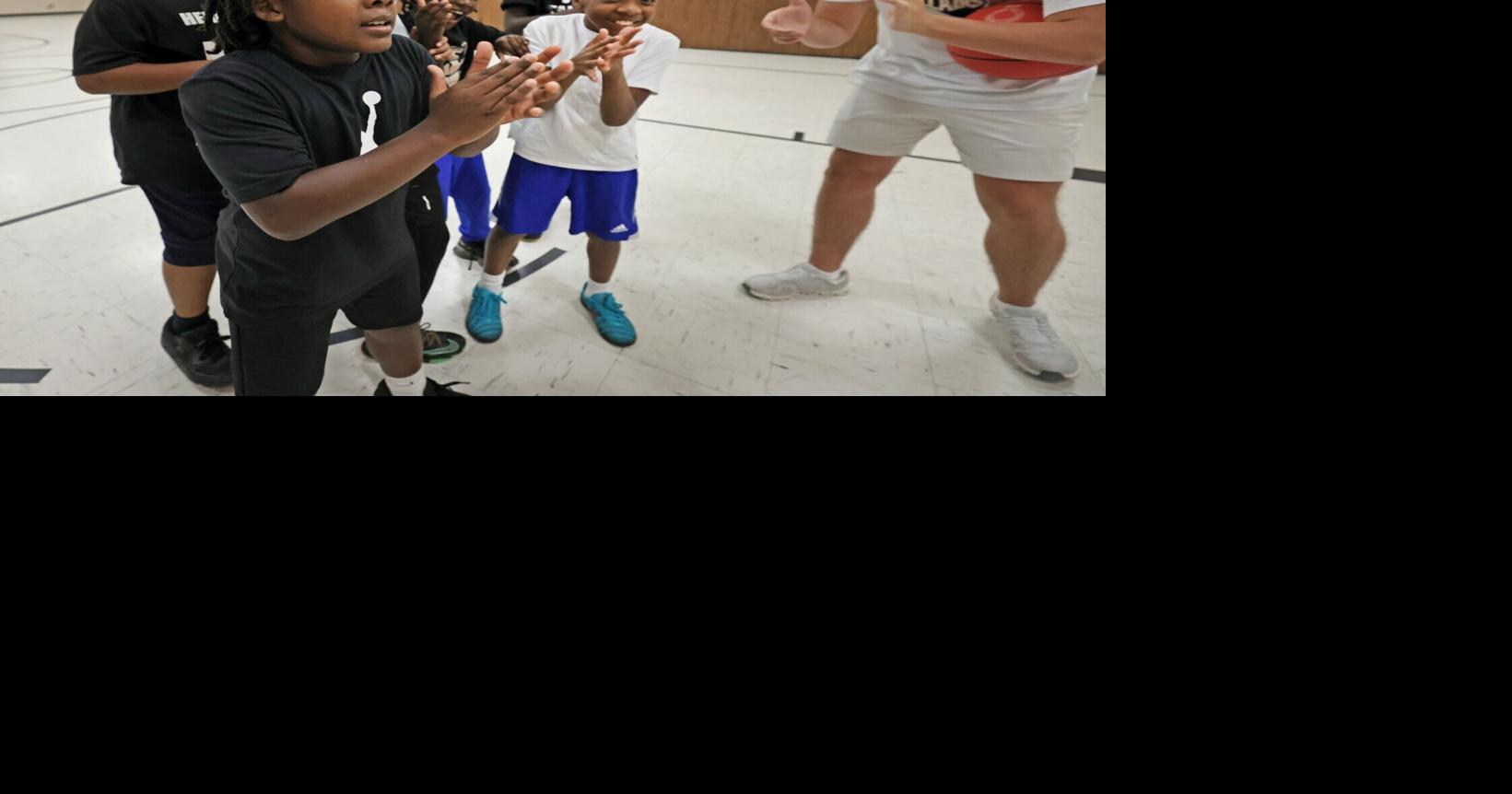The Bright Side: Bishop McGuinness basketball players give back during clinic at Griffith