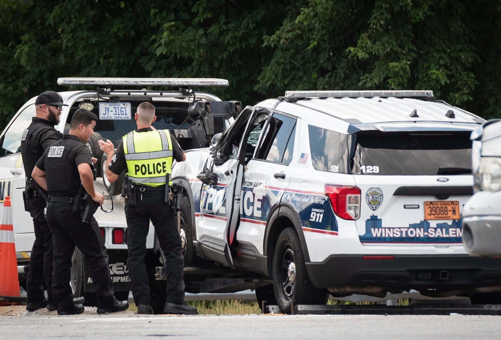 Police car overturns on Silas Creek Parkway in Wisnton-Salem