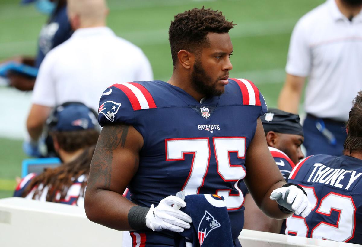 Justin Herron of the New England Patriots reacts on the sideline during the first half against the Las Vegas Raiders at Gillette Stadium on September 27, 2020 in Foxborough, Massachusetts.