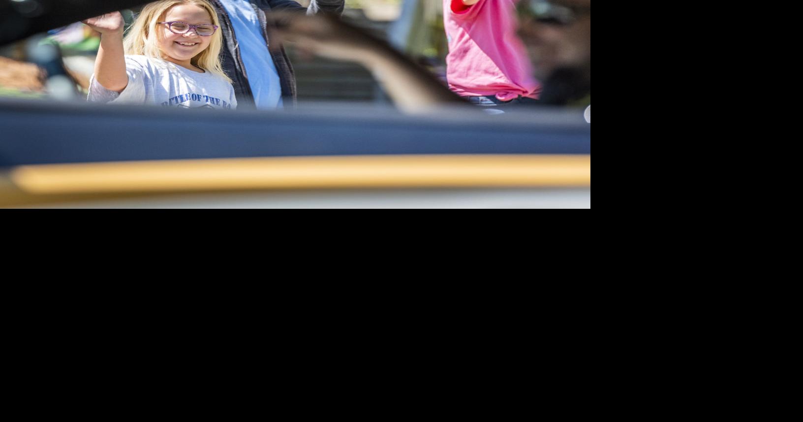 Photos Forsyth County Sheriff's Office Deputies Parade Through Lewisville Neighborhoods