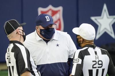Dallas Cowboys head coach Mike McCarthy talks with officials before A game against the Philadelphia Eagles on Sunday, Dec. 27, 2020 at AT&T Stadium in Arlington, Texas.