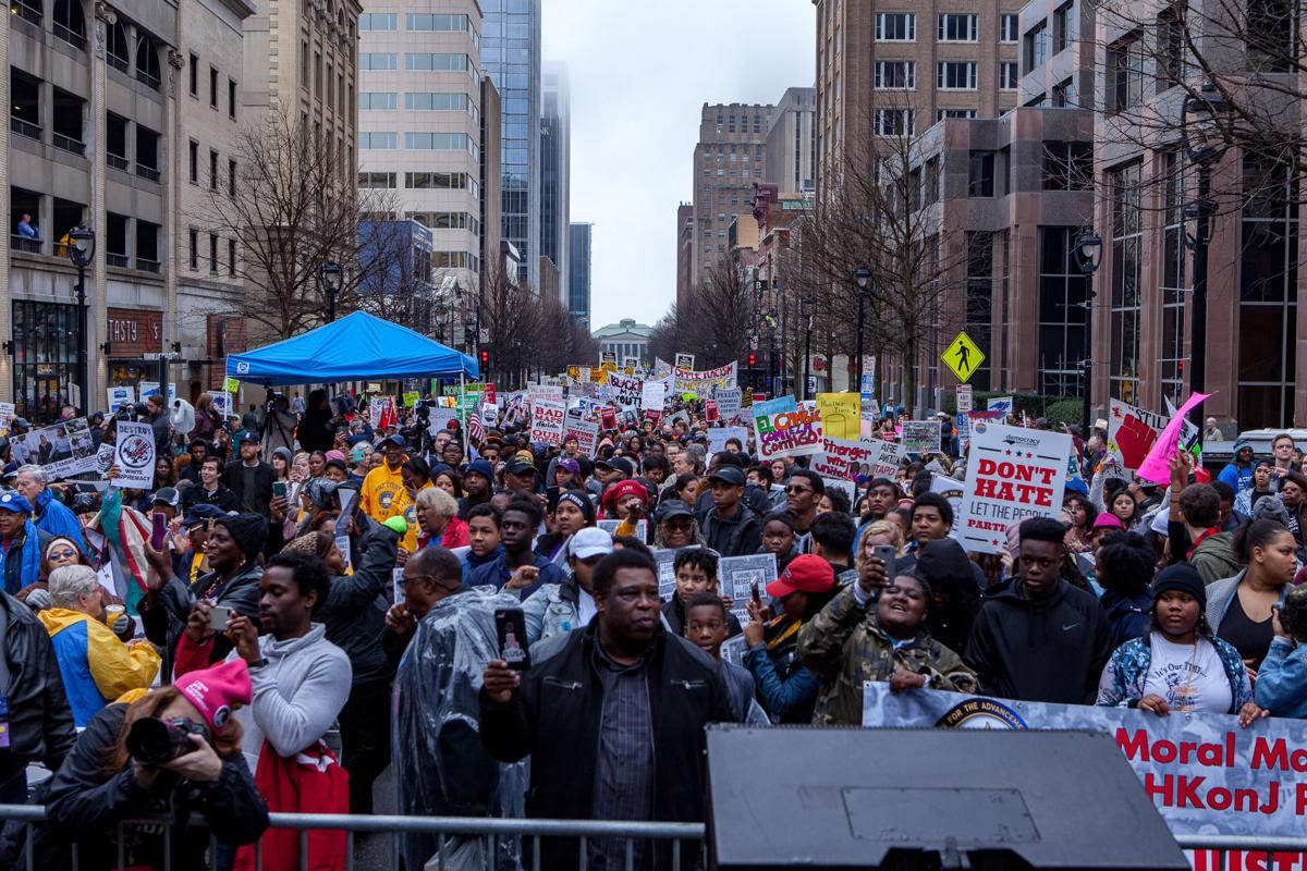 Despite rain, thousands rally at annual social justice march in Raleigh