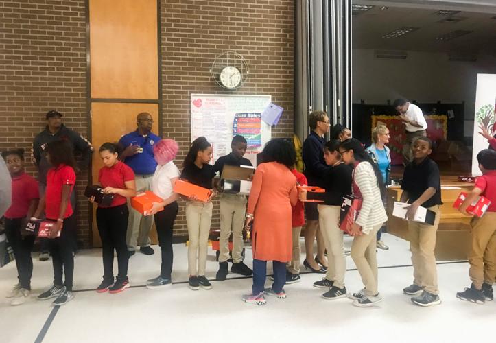 New shoes for students are thanks to Chris Paul Family Foundation