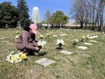 Kim Pettus tends to gravestones at St, Philips second graveyard