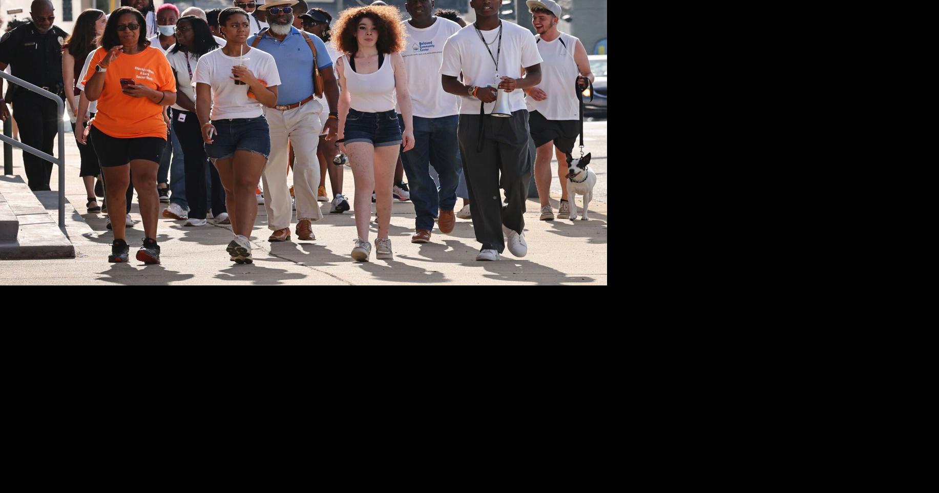 Walk calls for peace in the midst of Greensboro shooting that injured nine, see the photos