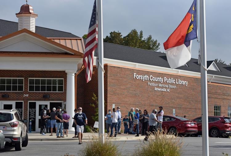 How many thousands showed up to vote in Forsyth County on the first day