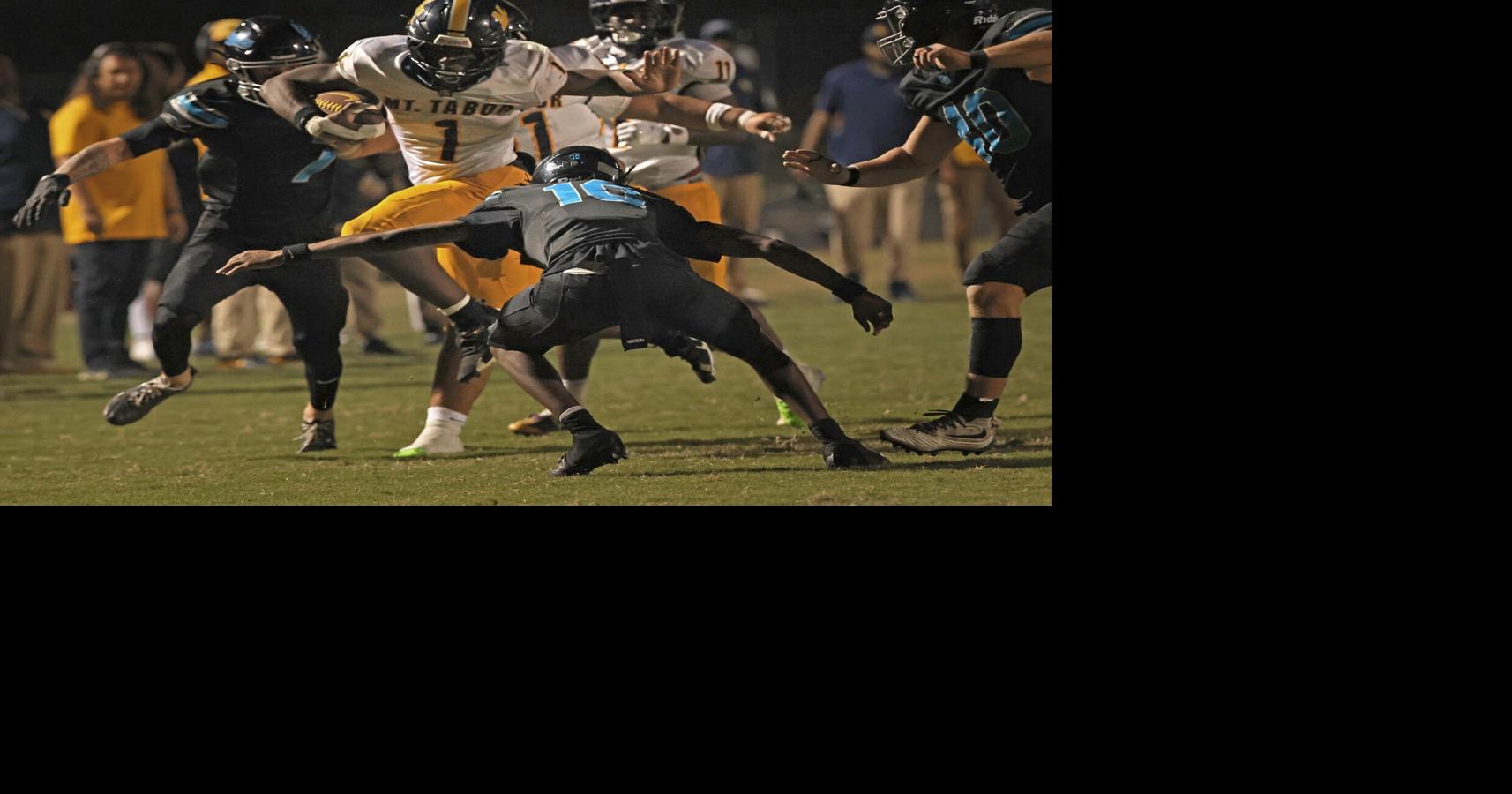See photos of Mount Tabor football's win over Oak Grove