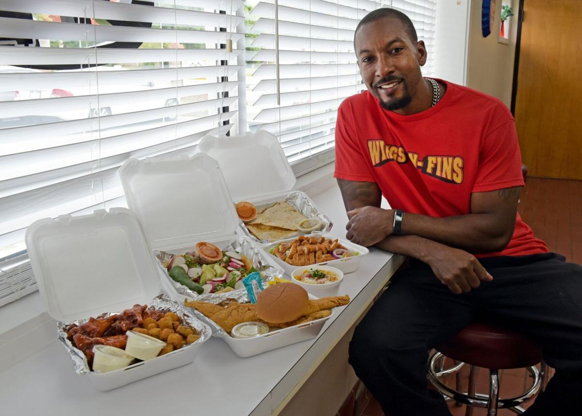 PHOTOS Wings N Fins opens brick and mortar location on Old Rural