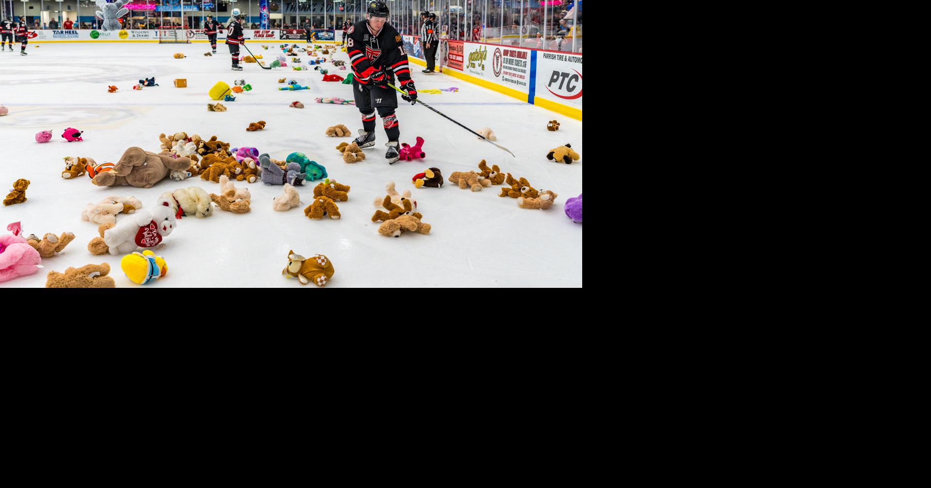 8K teddy bears tossed onto ice at Winston-Salem hockey game