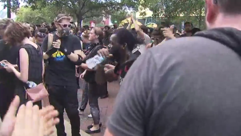 North Carolina protesters use strap to pull down Confederate soldier statue North Carolina protesters use strap to pull down Confederate soldier statue
