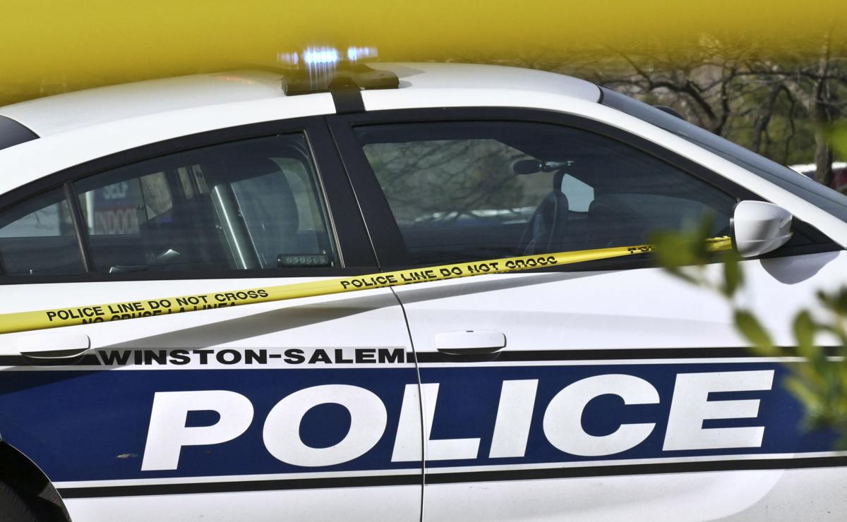 Winston-Salem police car with crime scene tape (copy)