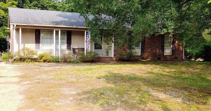 Man charged with killing father in Greensboro, 2 others