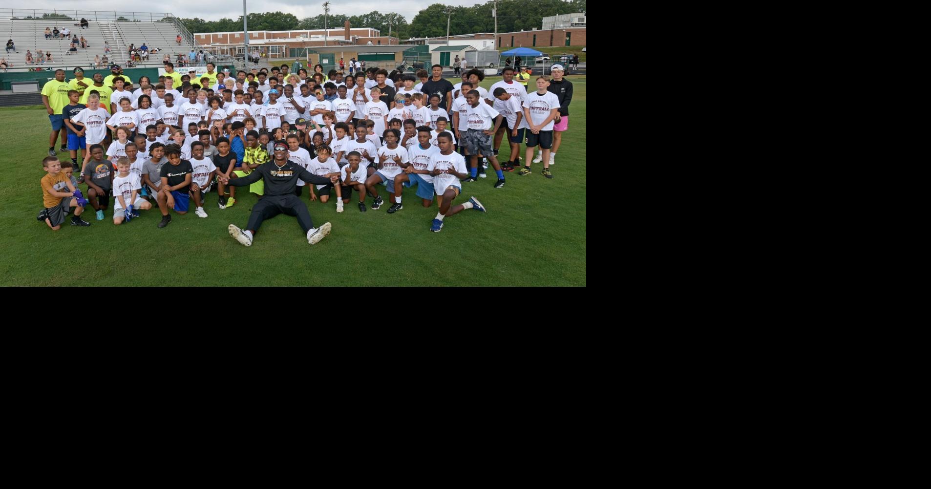 NFL players K.J. Henry, Shavon Revel to hold football camps at their former high schools this summer