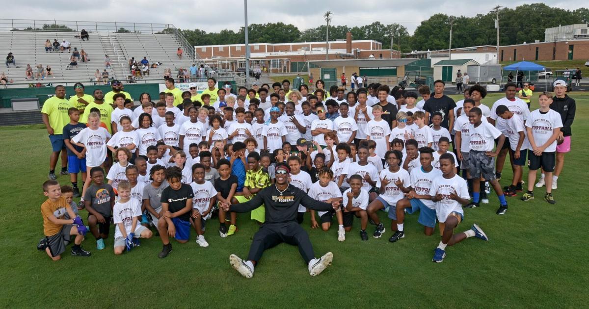 NFL players K.J. Henry, Shavon Revel to hold football camps at their former high schools this summer