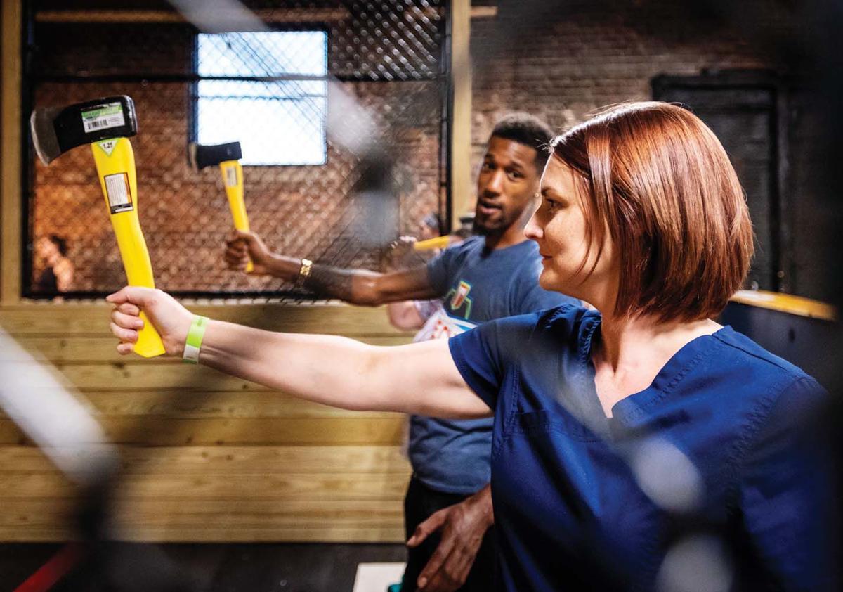 Ax throwing As A Social Sport Takes The Triad By The Handle Features ax-throwing-as-a-social-sport-takes-the-triad-by-the-handle-features