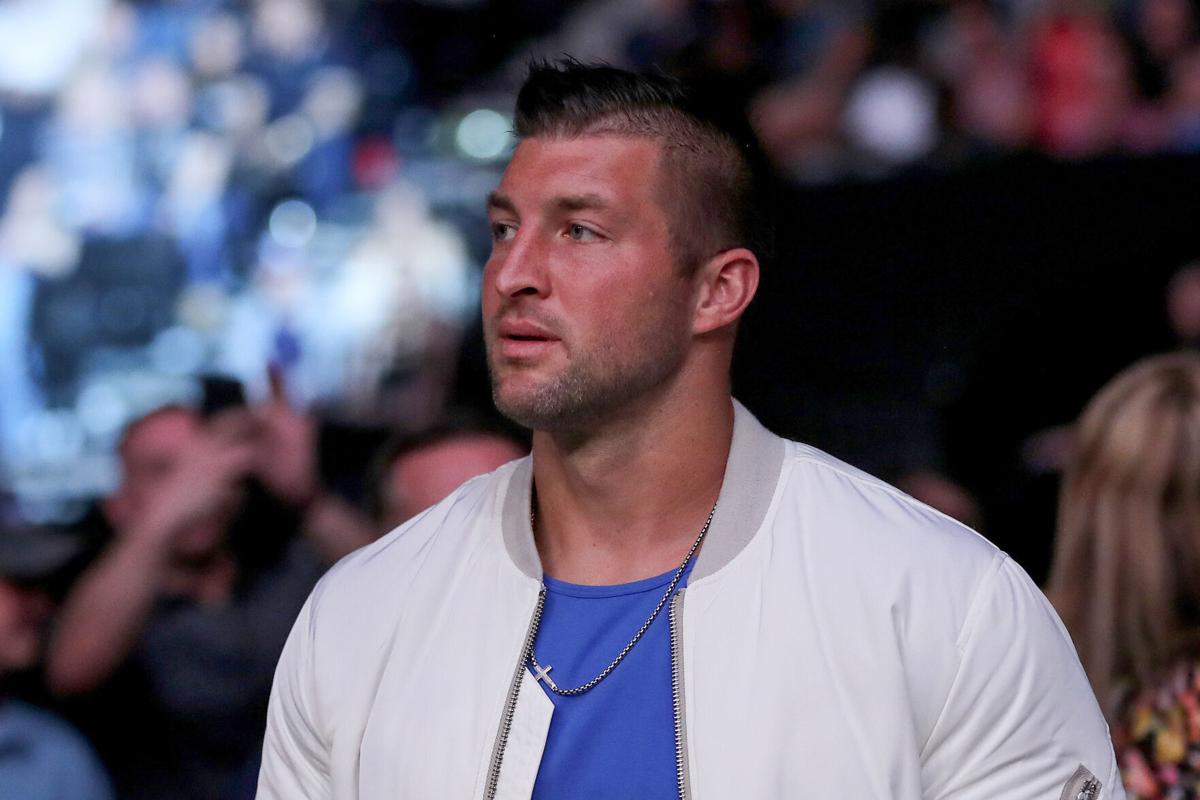 Tim Tebow is seen by the octagon during UFC 261 at VyStar Veterans Memorial Arena on April 24, 2021 in Jacksonville, Florida.