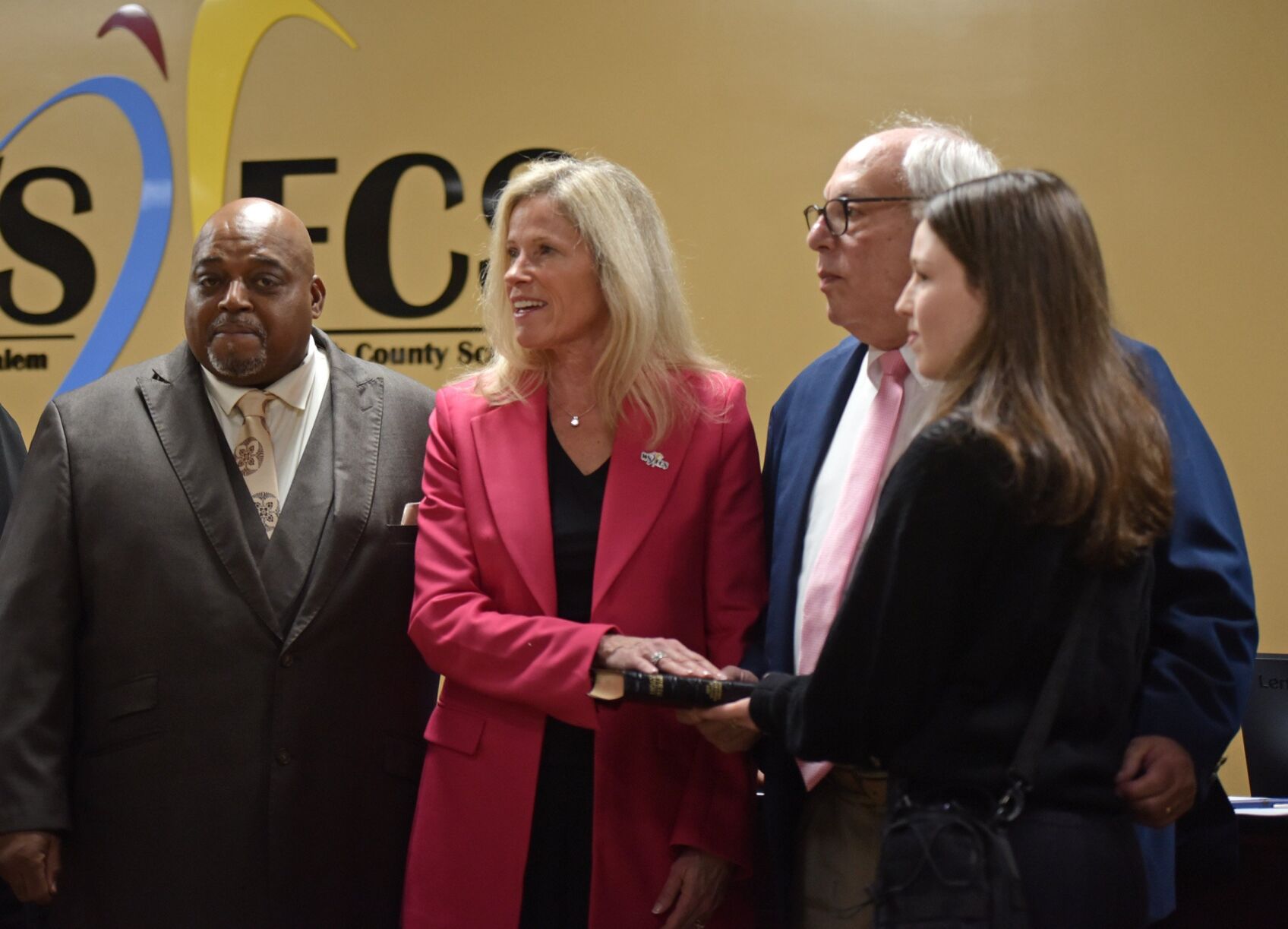 Nine school board members take oaths of office