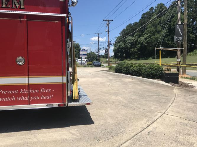 Vehicle crash closes stretch of Reynolda Road, causes power outages