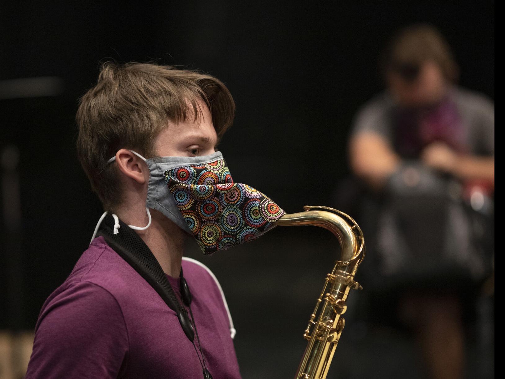 Musicians Improvise Masks For Wind Instruments To Keep The Band Together Entertainment Journalnow Com Buy the best and latest masked musicians on banggood.com offer the quality masked musicians on sale with worldwide free shipping. musicians improvise masks for wind