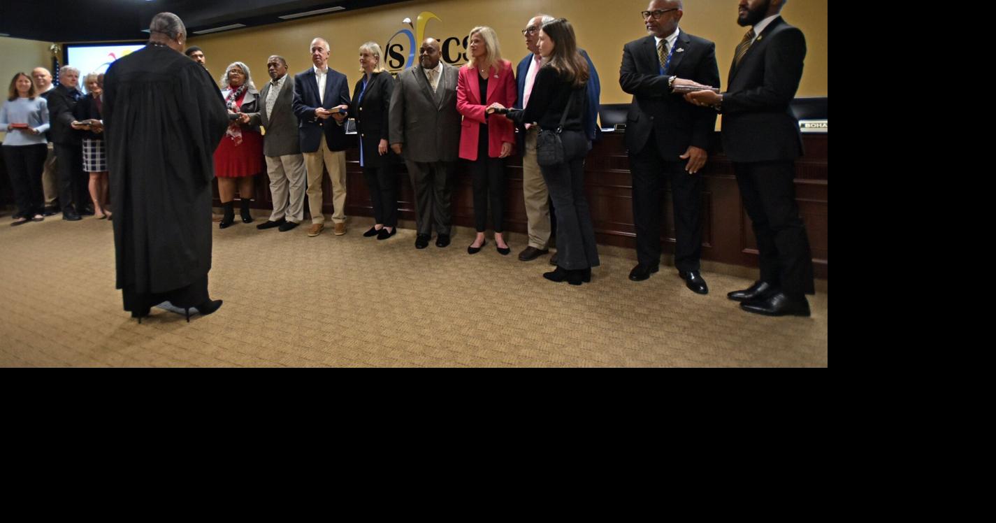 Nine school board members take oaths of office