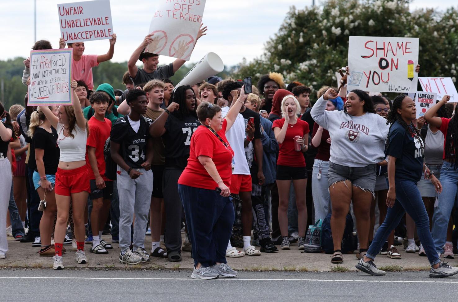 Forsyth County students stage walkout to protest job cuts