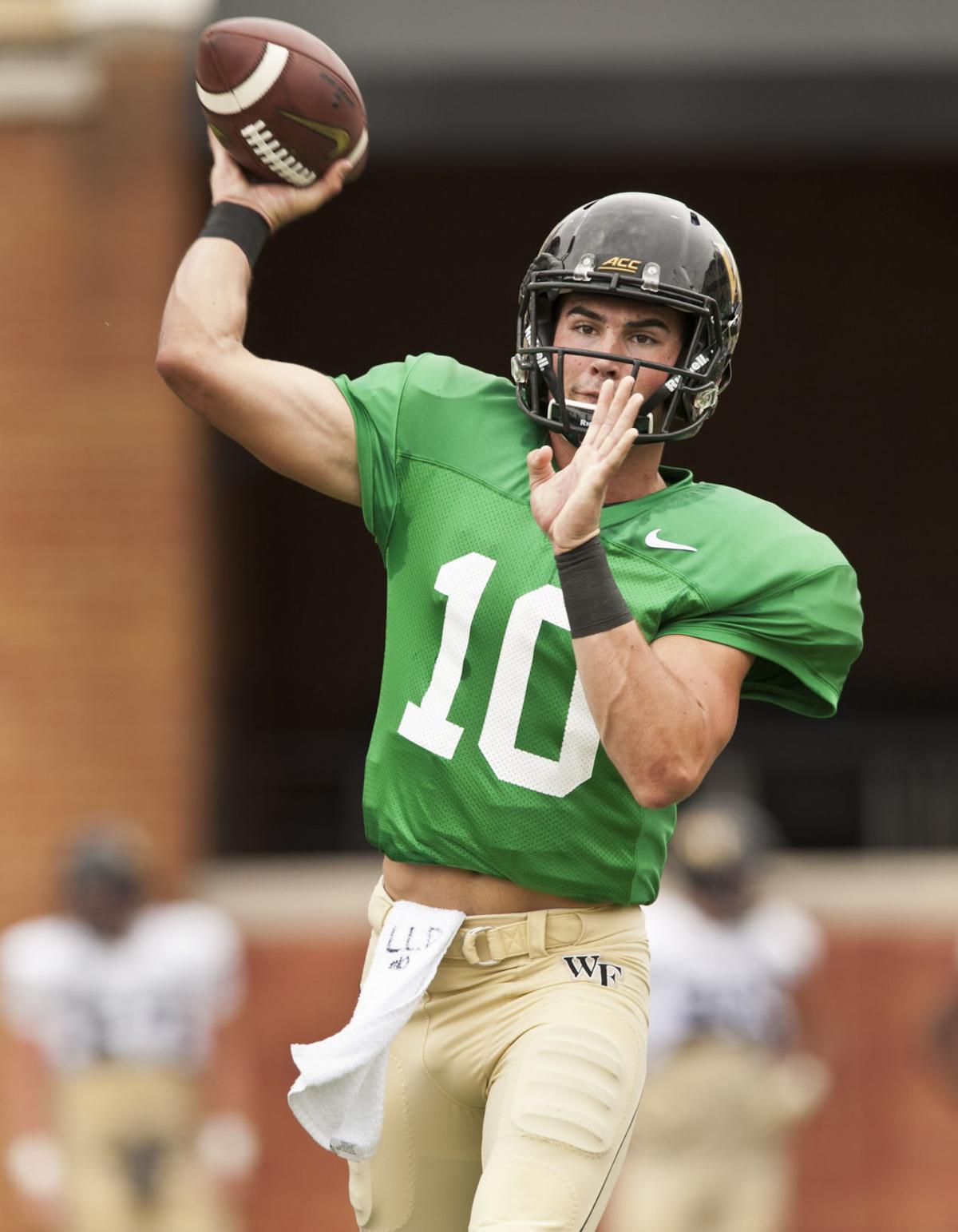 Hartman steps into lead QB spot as Newman misses Deacons practice with