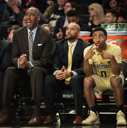 Emotional Day: Father joins son on Duke bench 