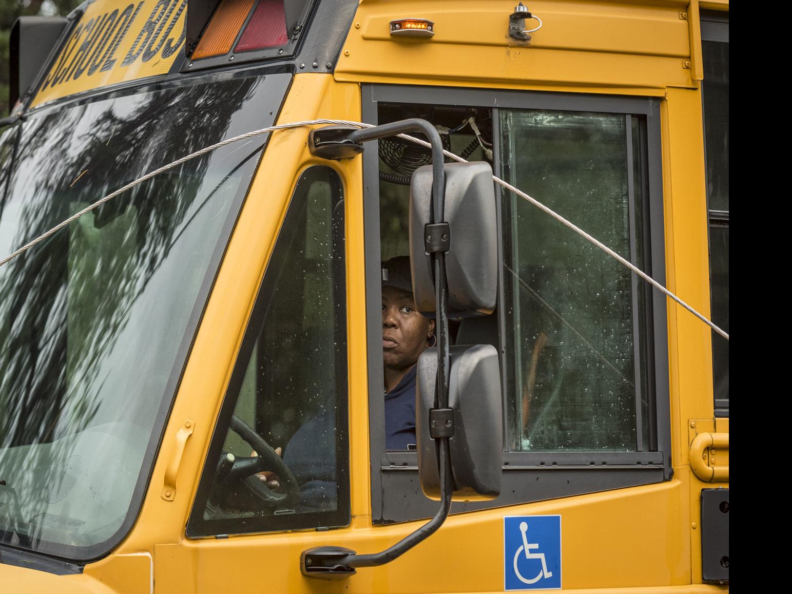 Driver trapped in school bus in Winston-Salem after power line