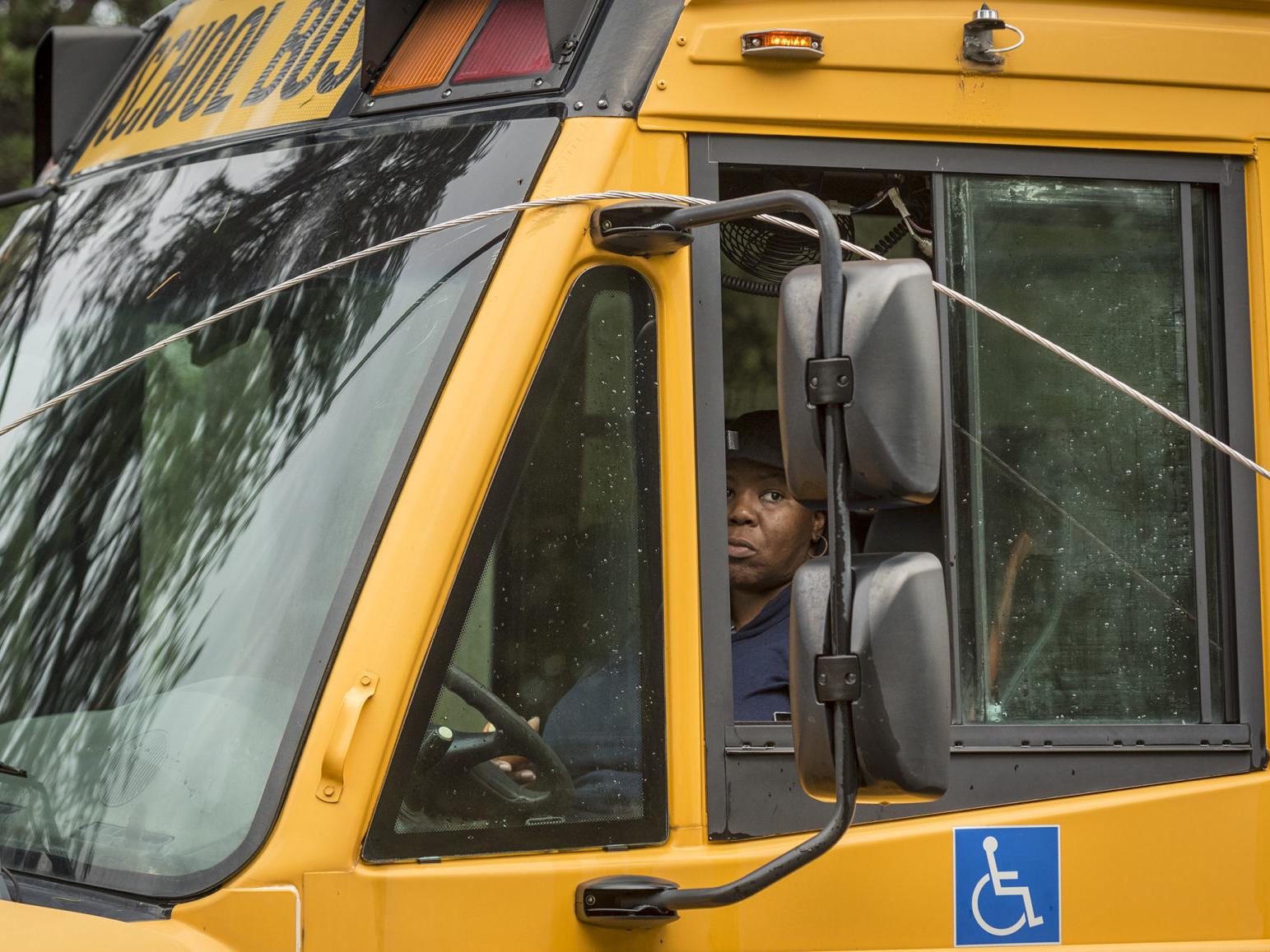 Driver trapped in school bus in Winston-Salem after power line Driver trapped in school bus in Winston-Salem after power line
