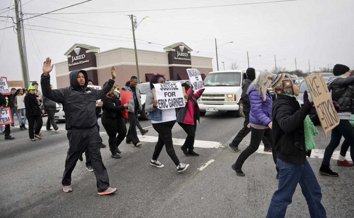 Protesters line Hanes Mall Boulevard Galleries
