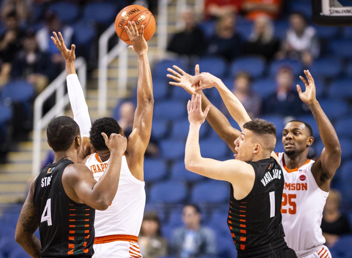 Dawes Leads Clemson Past Miami 69 64 In Acc Tournament College