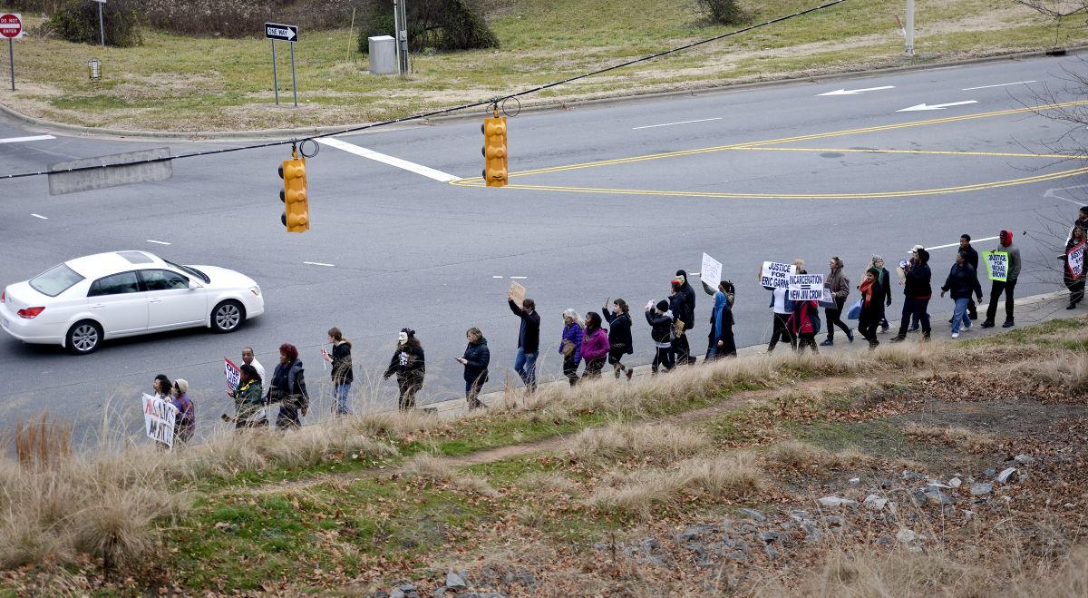 Protesters line Hanes Mall Boulevard Galleries