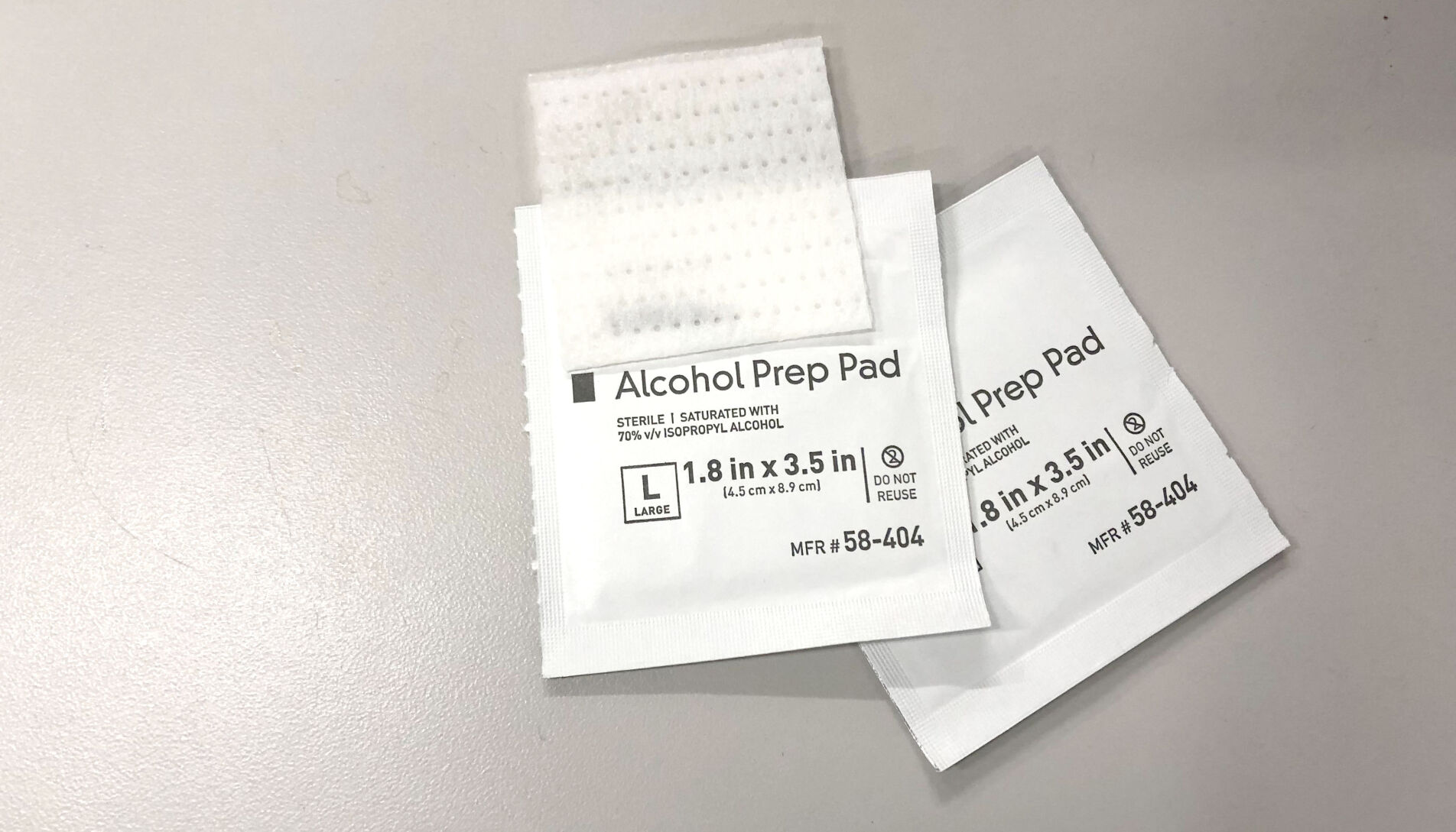 Sniffing alcohol pads for outlet nausea